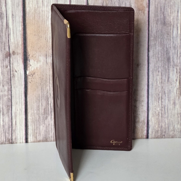 Cartier Handbags - Cartier Burgundy Leather Wallet